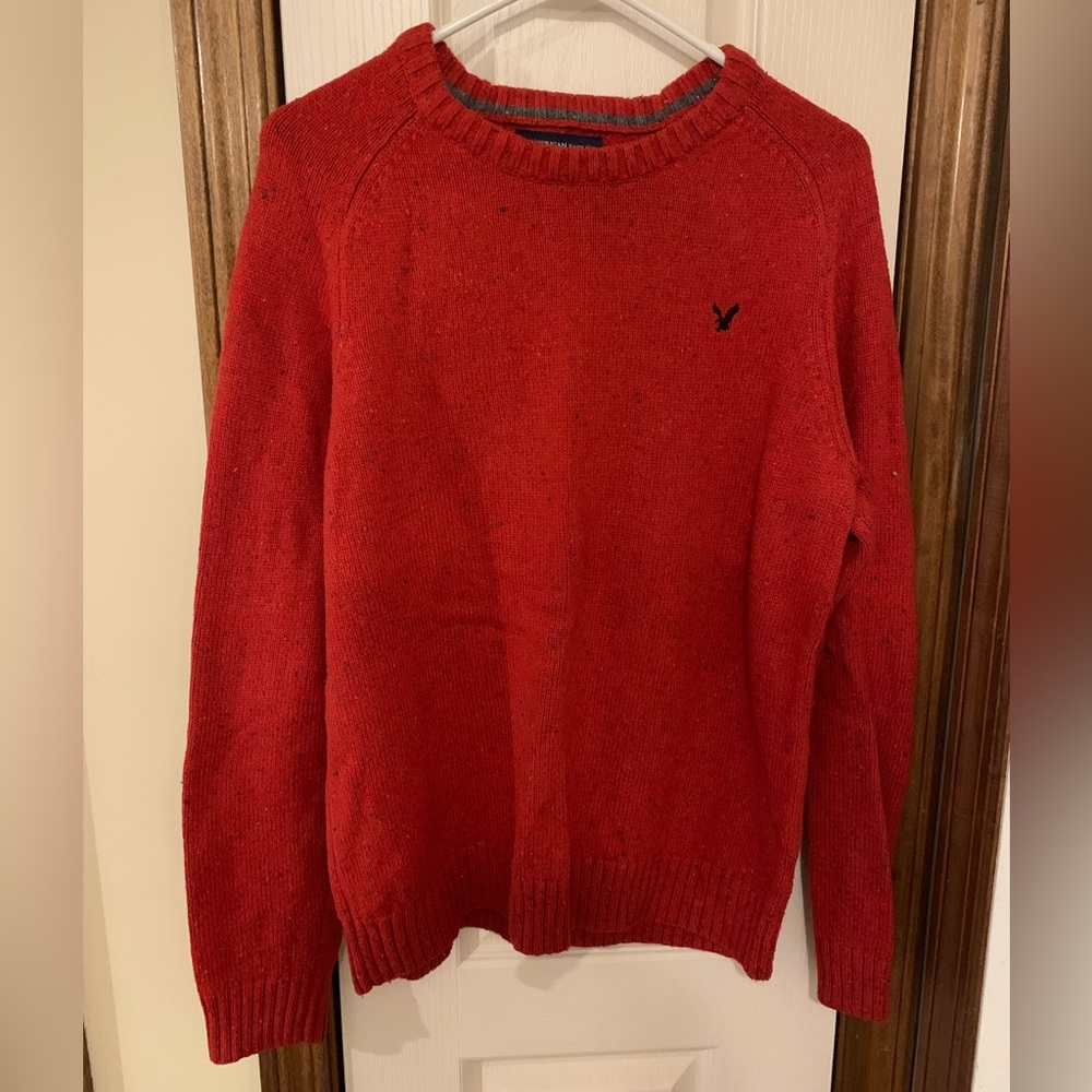 American Eagle red-orange sweater with brown elbow patches, size large